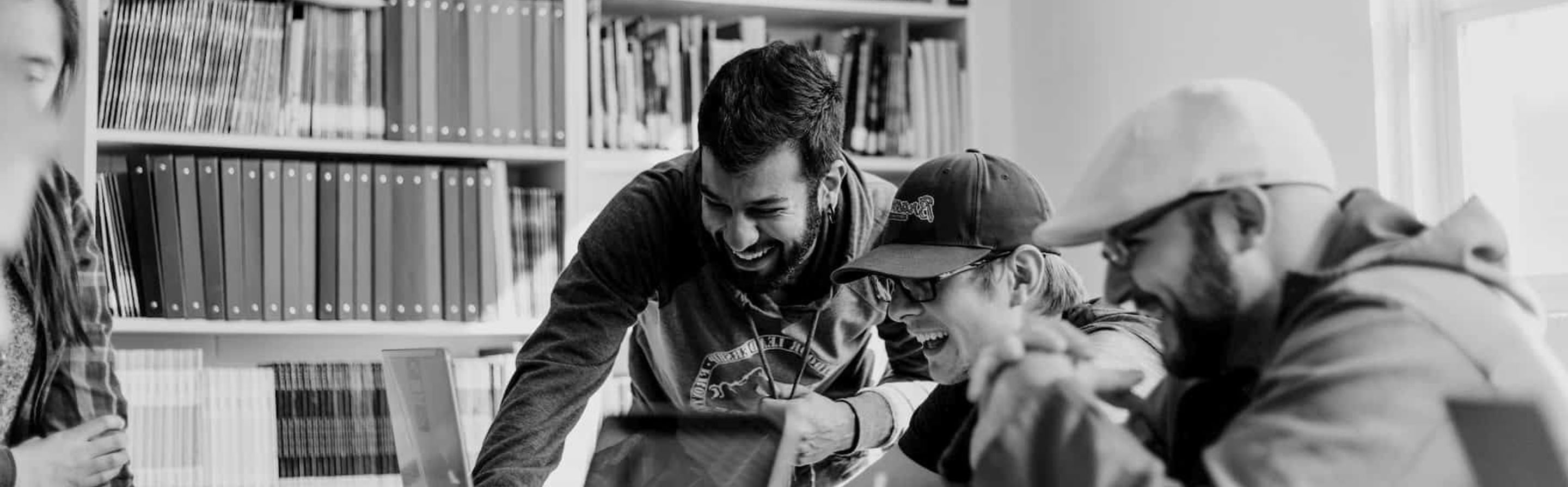 A group of people sitting in a library