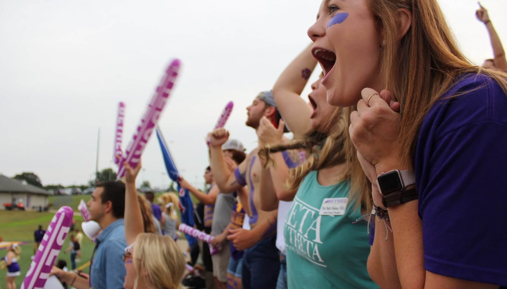 Students cheering at an event