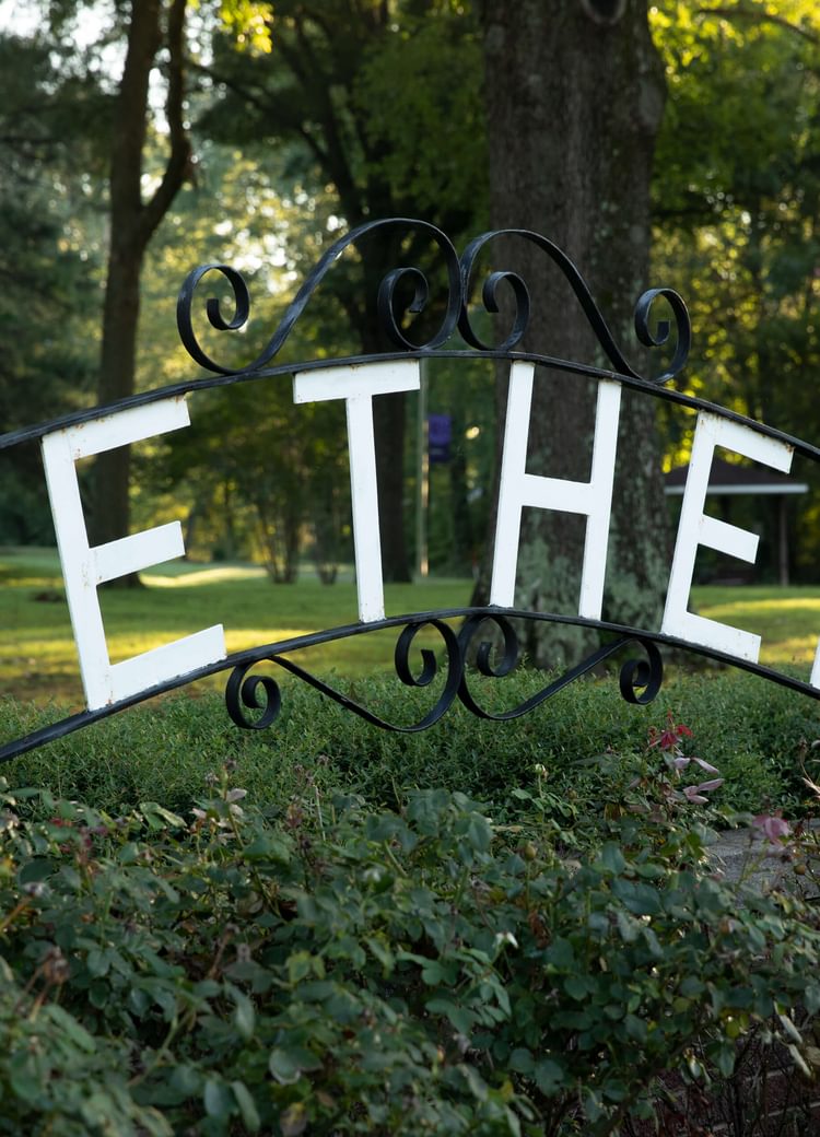 a metal Bethel sign on campus