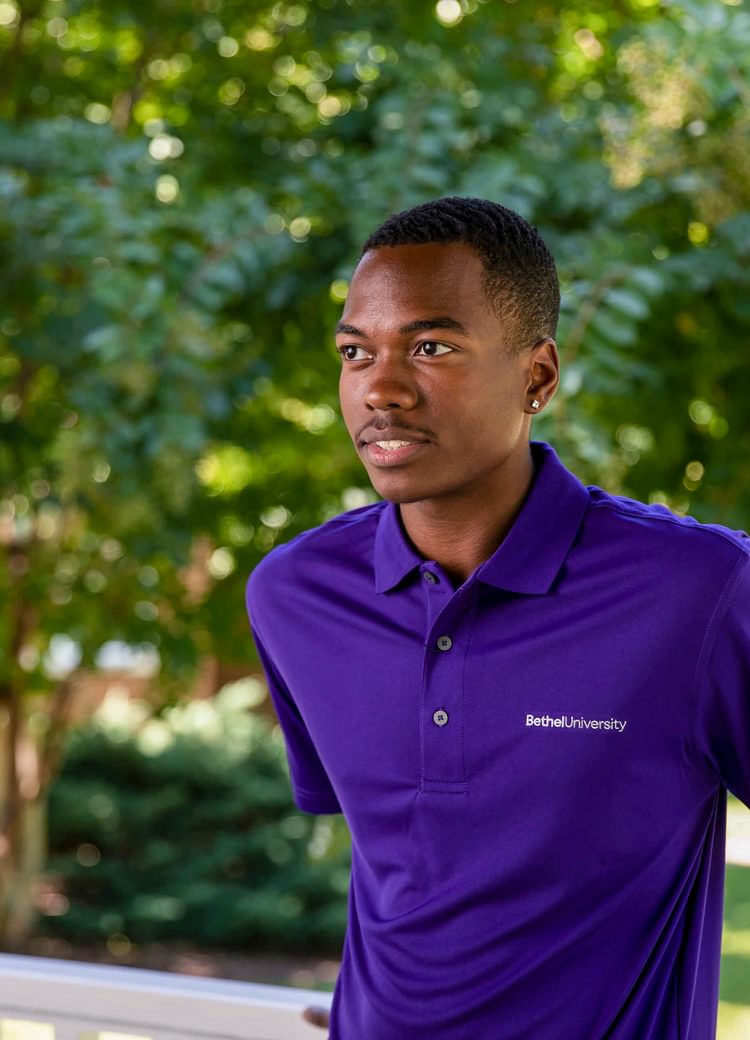 a student looks around outside