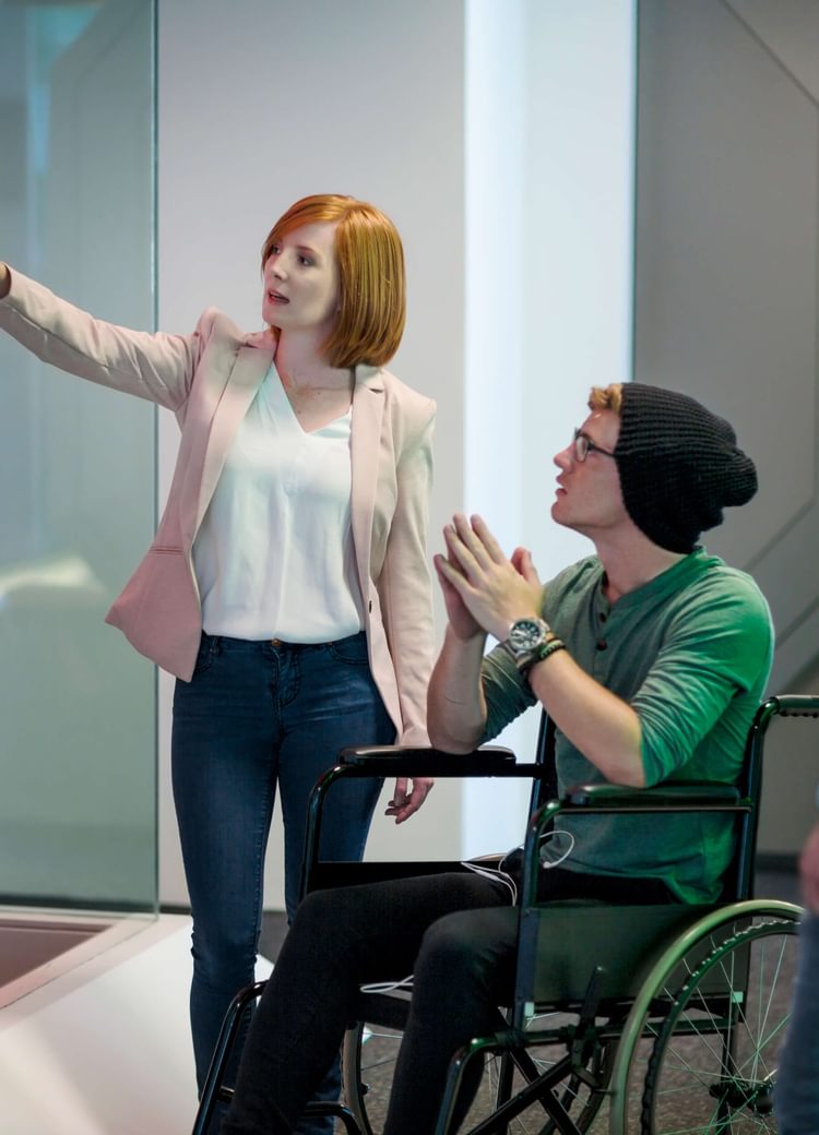 a university faculty member meets with a disabled student