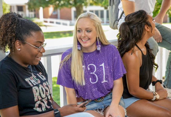 two female students talk about life on campus